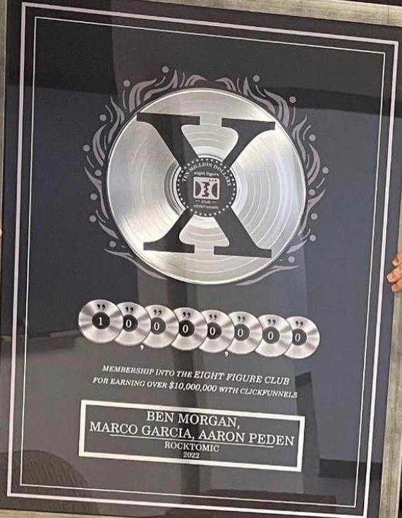 Rocktomic Eight Figure Club plaque naming Ben Morgan, Marco Garcia and Aaron Peden